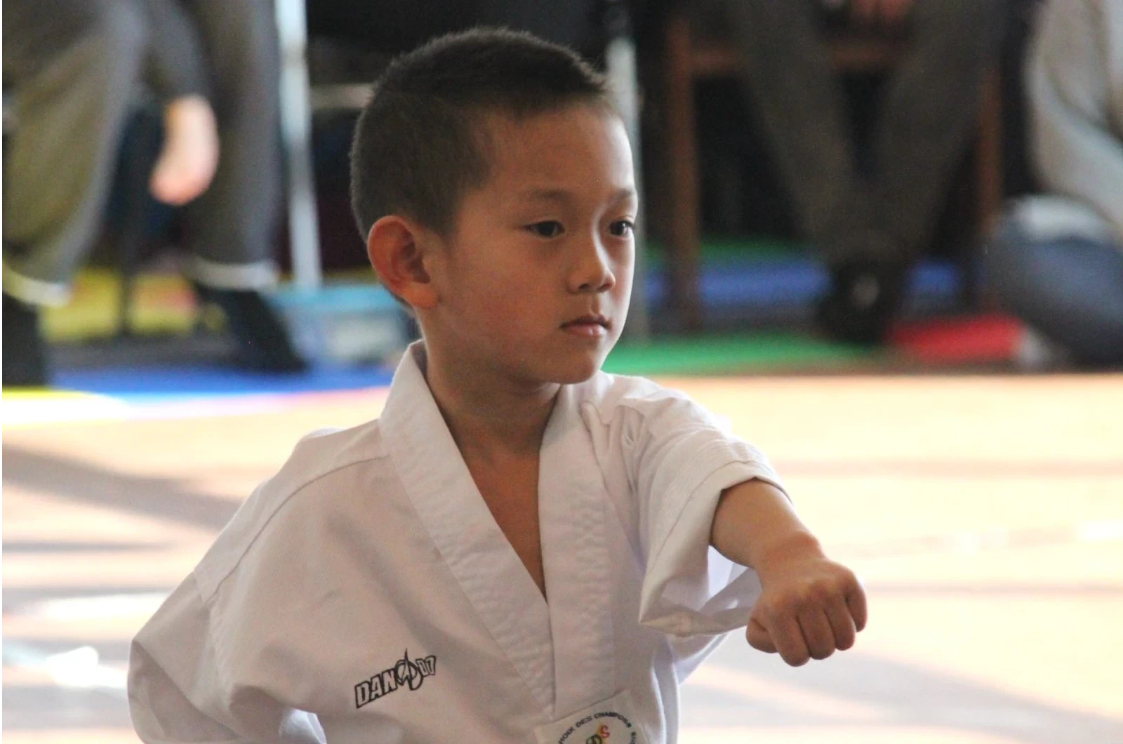 Kids learning patience through martial arts